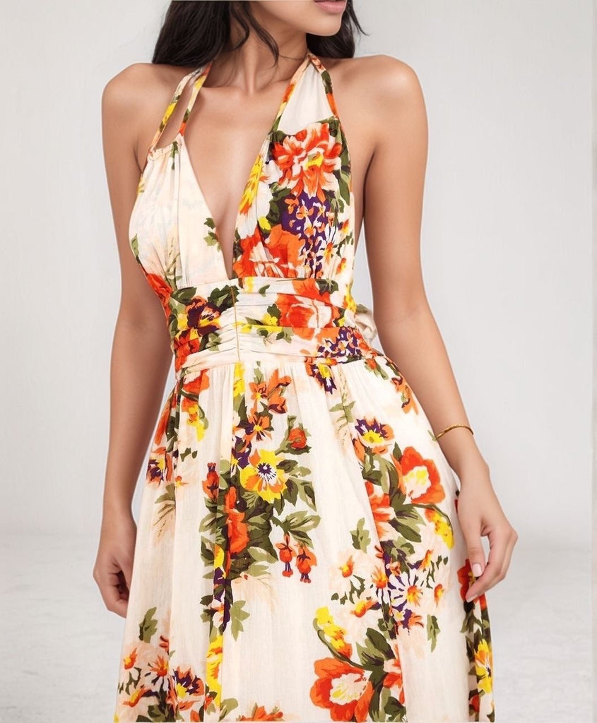 Floral Fête Sundress – front view of halter sundress with vibrant floral print and fitted waist