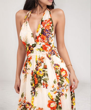 Floral Fête Sundress – front view of halter sundress with vibrant floral print and fitted waist