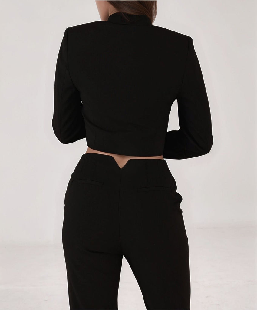Back view of black Noir Nouveau Suit with cropped blazer and tailored pants from Gamine Lebanon