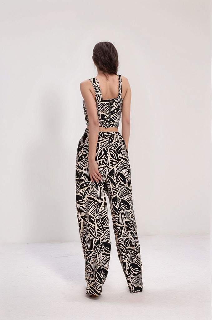 Peerless Printed Set – back view of sleeveless crop top and high-waisted wide-leg pants in abstract pattern