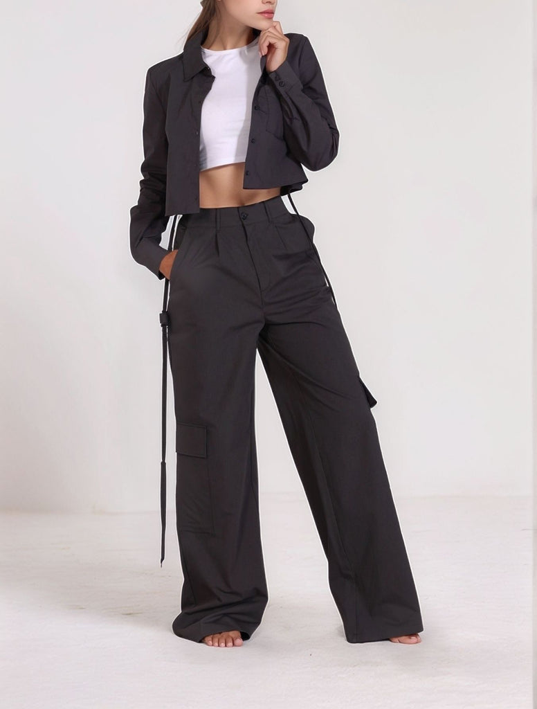 Front view of charcoal gray Urban Explorer Set styled with white crop top and utility trousers from Gamine Lebanon