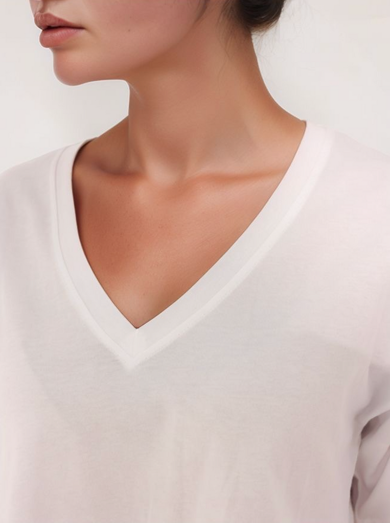 Close-up of Vista V top showing soft stretch knit fabric and clean hem detailing